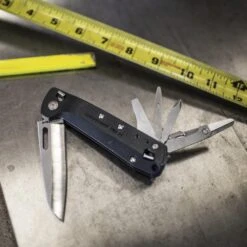 Leatherman FREE K4 Multipurpose Knife -Leatherman Depot Sales Store LT832664 Leatherman Free K4 on Workbench